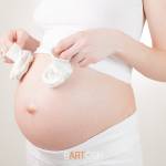 pregnant woman put booties to my stomach